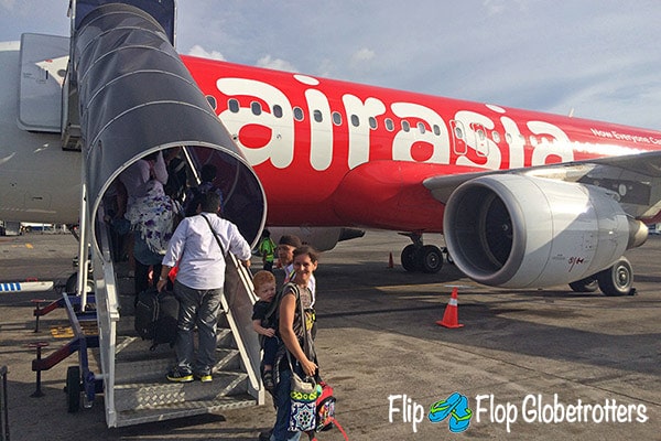 FlipFlopGlobetrotters.com - Blog: tips for flying with infants and toddlers - baby carrier